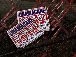 file photo signs for former obamacare health insurance plans lay next to a fence in columbia south carolina u s january 28 2023