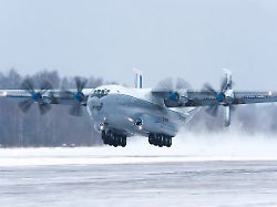 08 02 2018 russia tver region migalovo airfield the an 22 antey military transport aircraft performs a training flight in difficult weather conditions with a landing on a dirt strip