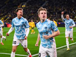 251210 jens petter hauge of bodc3b8 glimt celebrates after scoring 2 2 during the uefa champions league football match between borussia dortmund and bodc3b8 glimt on december 10 2025 in dortmund