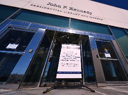 a sign notifies visitors that the john f kennedy presidential library and museum is closed due to a government shutdown wednesday oct 1 2025 in boston