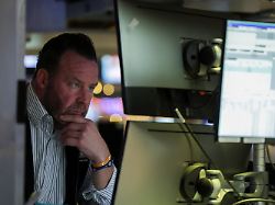 a trader works on the floor at the new york stock exchange nyse in new york city u s december 11 2025 1