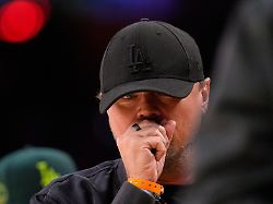 actor leonardo dicaprio leaves the court in the second half of an nba basketball game between the los angeles lakers and the san antonio spurs wednesday nov 5 2025 in los angeles ap photo mark j