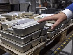 argor heraeus ceo robin kolvenbach touches bars at the plant of gold and silver refiner and bar manufacturer argor heraeus in mendrisio switzerland july 13 2022