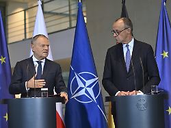 berlin germany december 01 polish prime minister donald tusk and german chancellor friedrich merz hold a joint press conference in berlin germany on december 01 2025