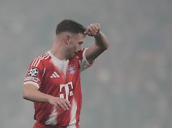 bayern s joshua kimmich reacts after scoring an own goal during the champions league opening phase soccer match between fc bayern munich and sporting cp in munich germany tuesday dec 9 2025