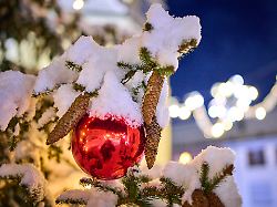 cars covered by snow and snow plows try to combat the heavy onset of winter and snowfall at christmas morning in marktoberdorf bavaria allgaeu germany dec 24 2024