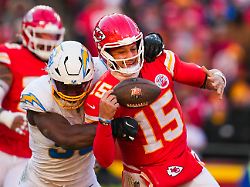 dec 14 2025 kansas city missouri usa los angeles chargers linebacker odafe oweh 98 sacks kansas city chiefs quarterback patrick mahomes 15 during the second half at geha field at arrowhead stadium