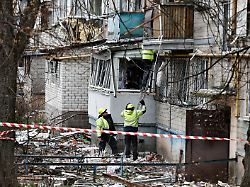 emergency responders work at the site of a russian drone strike on an apartment building amid russia s attack on ukraine in kyiv ukraine december 23 2025