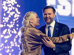 erika kirk greets vice president jd vance during turning point usa s americafest 2025 sunday dec 21 2025 in phoenix