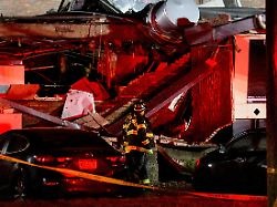 firefighters respond at the site of a gas explosion that caused a partial building collapse at the silver lake nursing home in bristol pennsylvania u s december 23 2025
