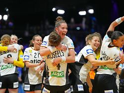 germany players celebrate their victory at the end of the women s handball world championship semifinal match between france and germany in rotterdam netherlands friday dec 12 2025 1