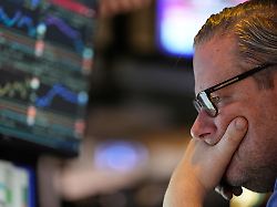 gregg maloney works on the floor at the new york stock exchange in new york wednesday dec 10 2025