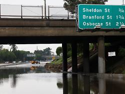 heavy machinery clears a section of the 5 freeway that was closed as heavy rains fall due to an atmospheric river in the sun valley area los angeles california u s december 24 2025