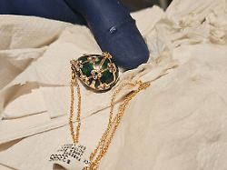 in this photo provided by the new zealand police a faberge pendant is held after it was recovered thursday dec 4 2025 from a man accused of stealing and swallowing the pendant