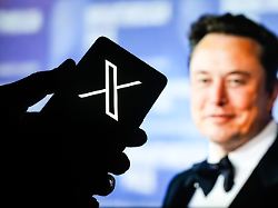 july 4 2025 ahmedabad gujarat india in this photo illustration an x logo application is prominently displayed on a smartphone screen with mr elon musk in the background 1