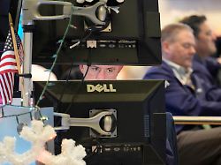 justin flinn left works on the floor at the new york stock exchange in new york wednesday dec 10 2025