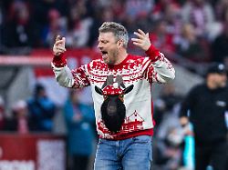 koeln rheinenergiestadion 22 12 2025 head coach lukas kwasniok of koeln with geissbock hennes christmas sweater reacts during the 1 bundesliga match 1 fc koeln vs fc union berlin 1