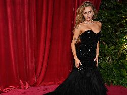 miley cyrus arrives at the premiere of avatar fire and ash on monday dec 1 2025 at dolby theatre in los angeles