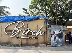 people stand outside the birch by romeo lane nightclub which has been sealed for investigation following a fire that killed multiple people in goa india december 7 2025