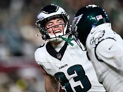 philadelphia eagles cornerback cooper dejean 33 celebrates after an interception against the washington commanders during the second half of an nfl football game saturday dec 20 2025 in landover md