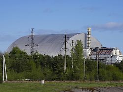 photo shows the chernobyl nuclear power plant covered with a dome like shelter in northern ukraine on april 26 2025 the 39th anniversary of the nuclear disaster