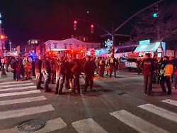 police officers and first responders gather at waterman st and thayer in response to a shooting in providence r i during reports of a shooting saturday dec 13 2025