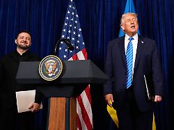 president donald trump and ukraine s president volodymyr zelenskyy depart a joint news conference at trump s mar a lago club sunday dec 28 2025 in palm beach fla