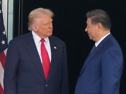 president donald trump left and chinese president xi jinping look at each other after their summit meeting at gimhae international airport jinping in busan south korea thursday oct 30 2025