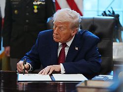 president donald trump signs an executive order designating fentanyl as a weapon of mass destruction in the oval office of the white house on monday december 15 2025