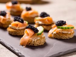 smoked salmon canapes with sour cream and caviar publicationxinxgerxsuixautxonly copyright xgisnex panthermedia18592604