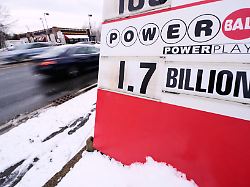 the jackpot for the powerball lottery game is displayed outside ted s state line mobil station wednesday dec 24 2025 in methuen mass