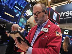 trader william lawrence works on the floor of the new york stock exchange thursday dec 11 2025