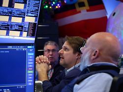 traders work on the floor at the new york stock exchange nyse in new york city u s december 10 2025