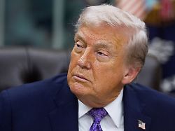 u s president donald trump looks on as he signs an executive order on ai in the oval office at the white house in washington d c u s december 11 2025