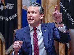 united states secretary of war pete hegseth answers a reporters question during a cabinet meeting in the cabinet room of the white house in washington dc usa on tuesday december 2 2025