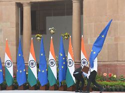 2 28 2025 the staff of hyderabad house arranges flags of eu and india in preparation for a meeting between prime minister narendra modi and european commission president ursula von der leyen