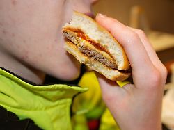 a mcdonalds cheeseburger is seen in warsaw poland on 30 december 2025