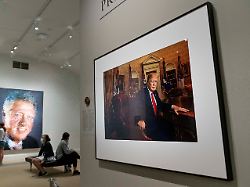 a photograph of former president donald trump by pari dukovic hangs in the america s presidents exhibition at the smithsonian s national portrait gallery in washington friday may 14 2021