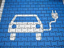 a sign is seen on a parking space with charging station for an electric car at a shopping mall in bochum western germany on october 15 2025