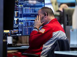 a trader works on the floor at the new york stock exchange nyse in new york city u s january 13 2026