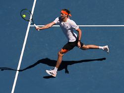 alexander zverev of germany plays a forehand return to gabriel diallo of canada during their first round match at the australian open tennis championship in melbourne australia sunday jan 18 2026