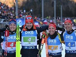 biathlon weltcup staffel 4 x 7 5 km herren deutschlands justus strelow danilo riethmueller david zobel und philipp nawrath l r feiern im zielbereich