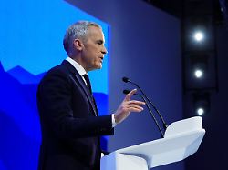 canada prime minister mark carney delivers a speech at the world economic forum in davos switzerland on tuesday jan 20 2026