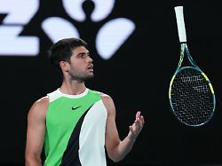 carlos alcaraz of spain reacts during his quarterfinal match against alex de minaur of australia at the australian open tennis championship in melbourne australia tuesday jan 27 2026