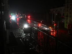 cars move along a dark street during a power blackout after critical civil infrastructure was hit by today s russian drone strikes amid russia s attack on ukraine in zaporizhzhia ukraine january 7 2026