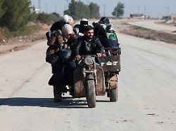 civilians of dayr hafir leave towards west fearing escalation between kurdish led syrian democratic forces sdf and syrian government in east of aleppo syria january 15 2026