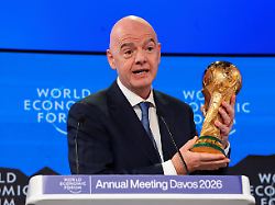 fifa president gianni infantino holds the fifa world cup trophy as he attends the 56th annual world economic forum wef meeting in davos switzerland january 22 2026