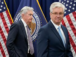 federal reserve board chair jerome powell left departs after participating in a swearing in ceremony monday may 23 2022 in washington at right is board member christopher waller