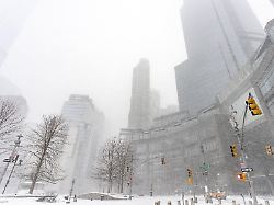 heavy snow falling during sunday s blizzard as seen on columbus circle in new york ny on january 25 2026