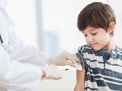 hispanic boy getting a shot at doctors office jersey city nj usa 21 12 2023 model released ttbb bld128042
